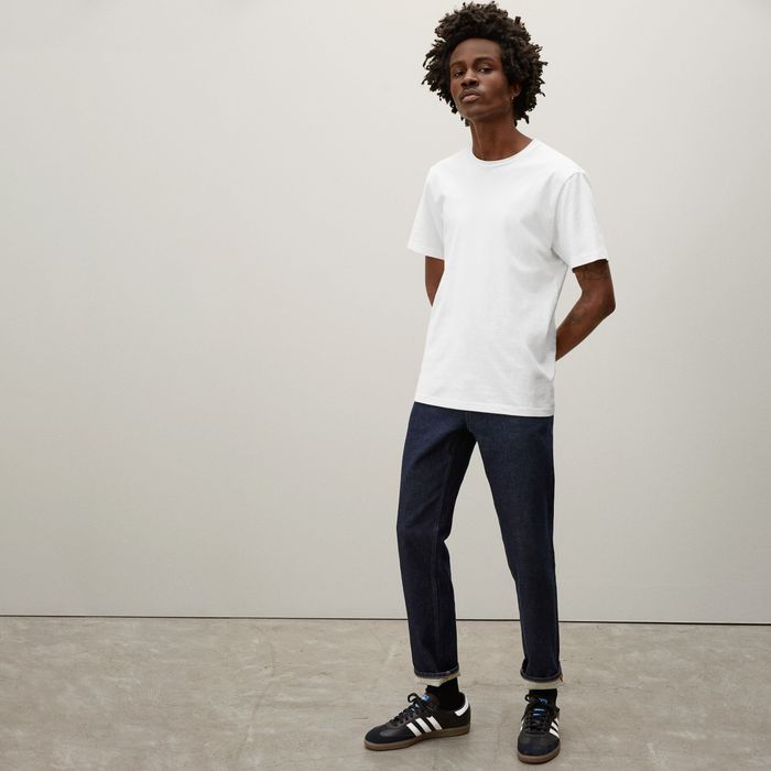 model styling the crewneck white tee with jeans