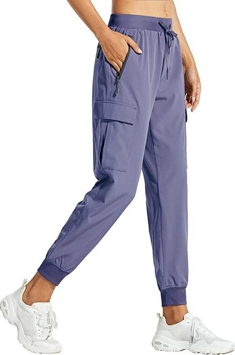A model showcasing the purple pants
