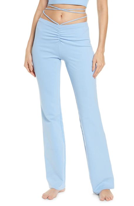 A model showcasing the powder blue leggings in a stylish display.