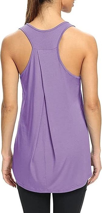 A model presenting the top from the back view.