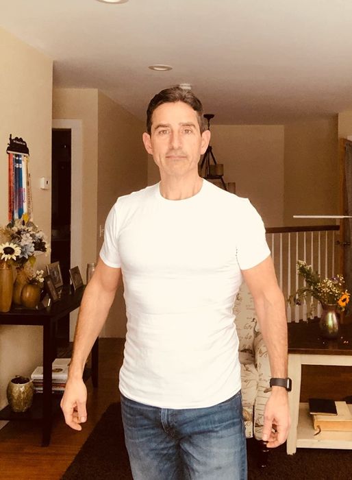 reviewer photo showcasing a white t-shirt