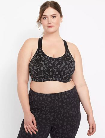 front view of a black leopard-print sports bra