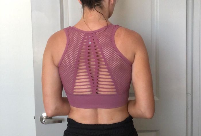 Reviewer photo showcasing their back in the sports bra