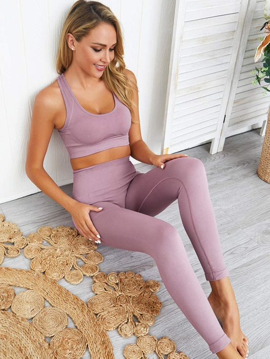 The model is showcasing the same matching set, but in a soft lilac hue.