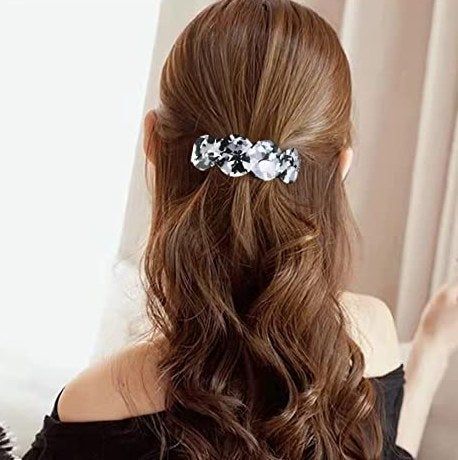 A model showing off the hair barrette clips.