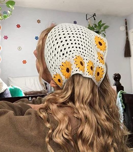 A model showcasing the crochet hair scarf.