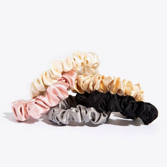 A set of hair scrunchies in a variety of colors.