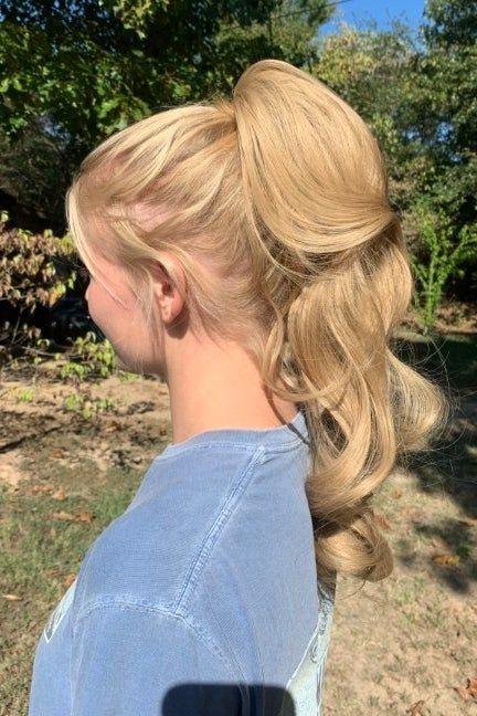 Reviewer wearing the wavy clip-in ponytail.