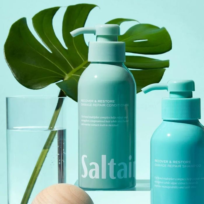 The turquoise bottle of the product