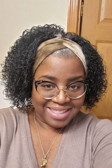 Reviewer wearing the twist-front headband.