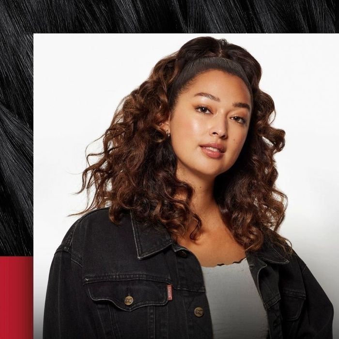 A person showcasing their curly hair.