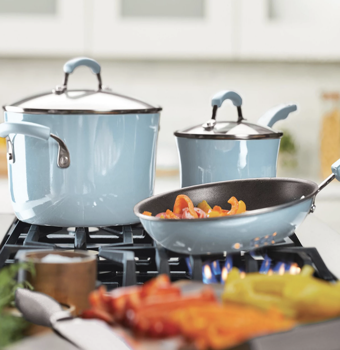 Three light blue cookware items: a pan, a sauce pot, and a smaller pot