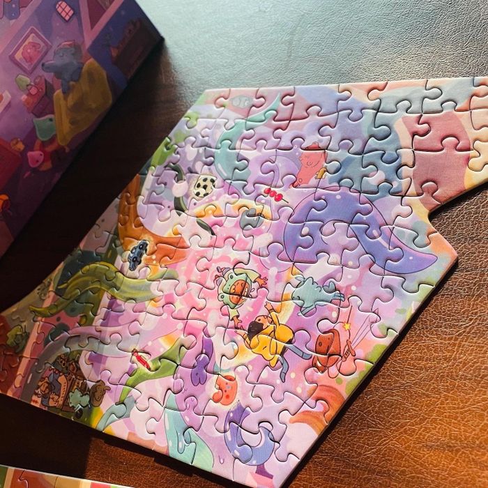 Photo from a reviewer showcasing a piece of the puzzle in shades of pink, purple, orange, and more