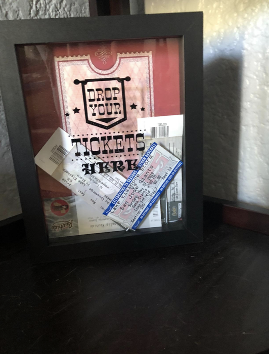 A reviewer’s photo of the box with a clear front, labeled 