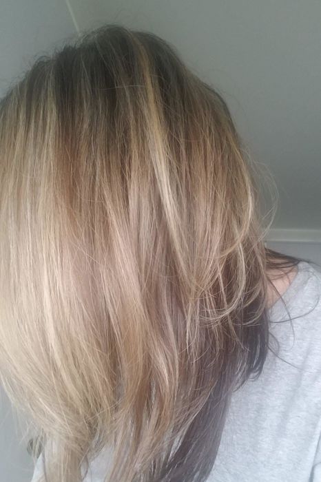 the glossy, smooth hair of the reviewer