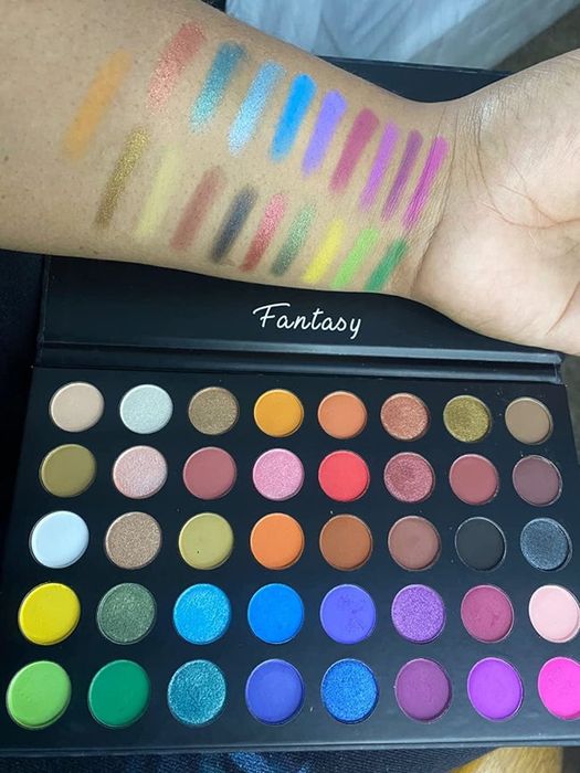Image of the full palette with swatches on the reviewer’s arm