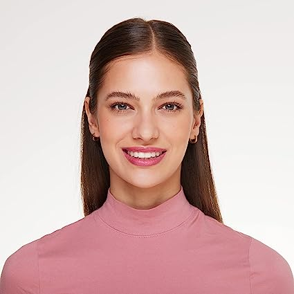 A model with a different skin tone wearing the lipstick