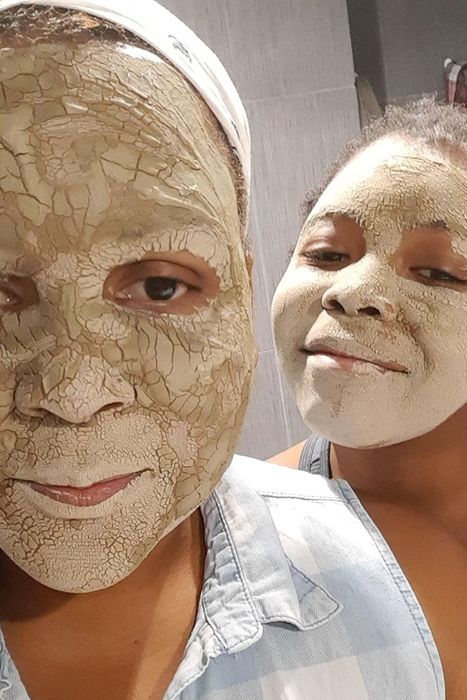 A selfie of two reviewers wearing the Aztec Secret Healing Clay face mask.