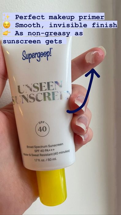 Mytour editor holding a 1.7oz bottle with a dab of translucent sunscreen, captioned