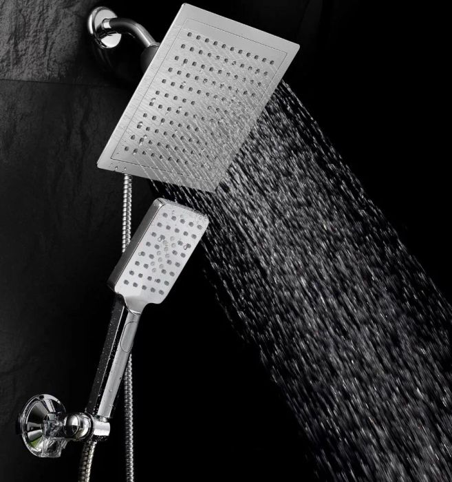 a square waterfall showerhead paired with a compact handheld showerhead