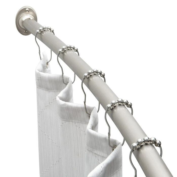 a sleek silver curved shower rod