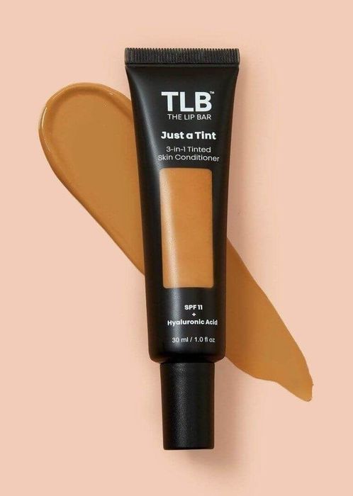 Model showing the before and after results of using the tinted skin conditioner.