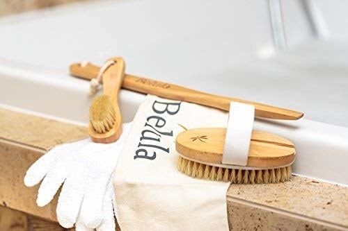 Small brush, hand brush, exfoliating gloves, and an extension handle.