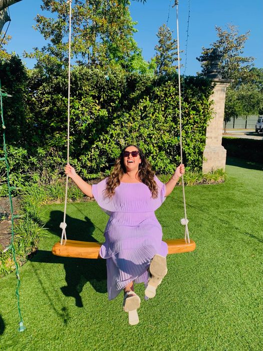 A writer rocking the dress in a soft lilac shade