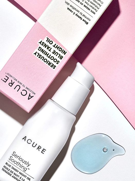 A white pump bottle containing the blue tansy night oil