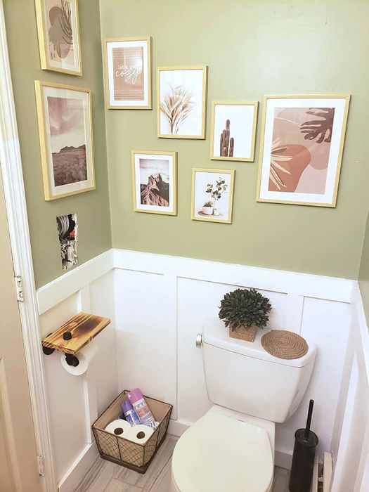 The bathroom of the reviewer with art pieces adorning the walls.