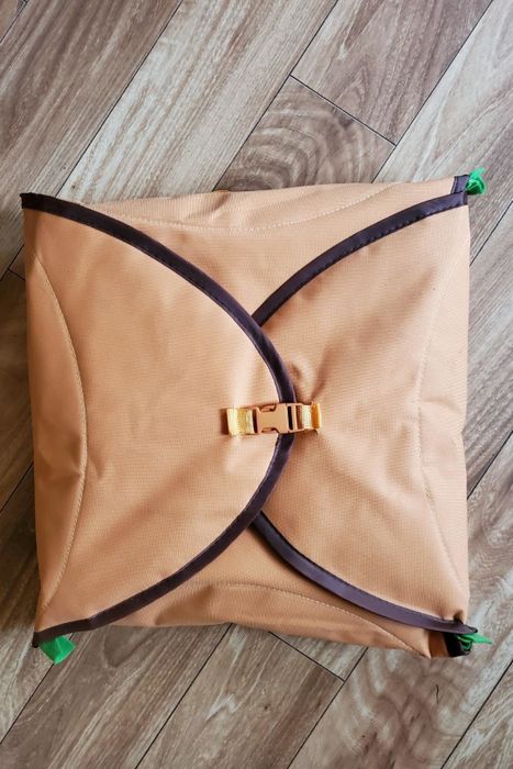 a photo of the snuffle mat neatly rolled up for storage or travel