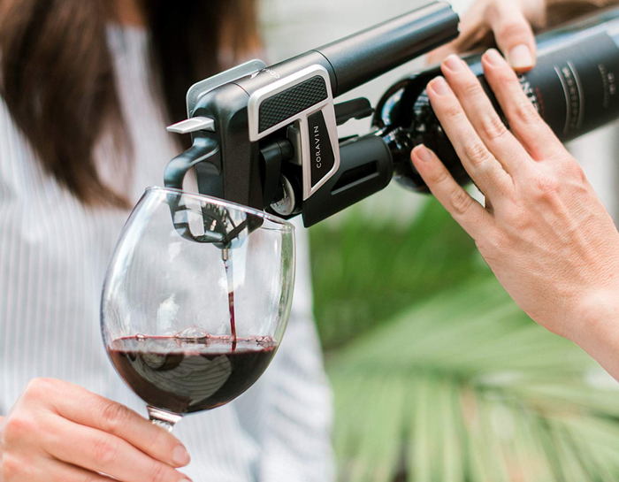 The Coravin wine preserver in action, pouring wine into a glass