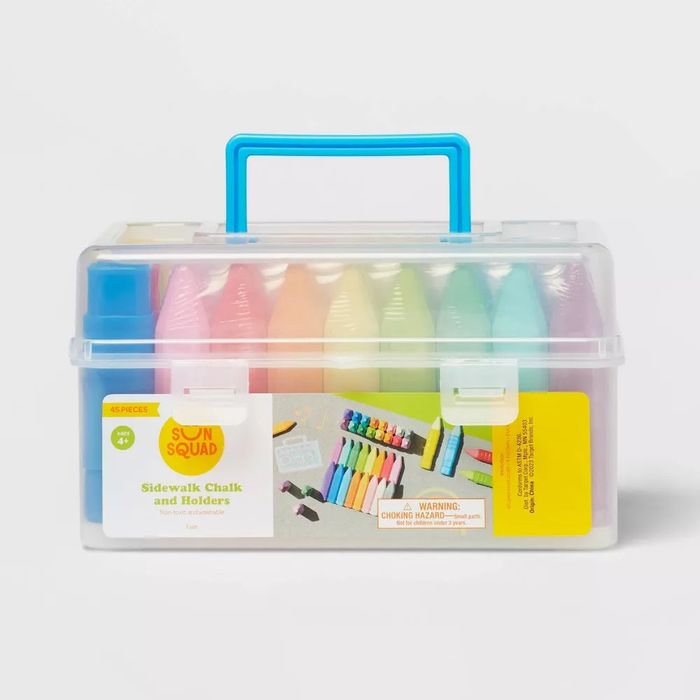 A clear plastic case holding an assortment of colorful chalk pieces, ready for use.