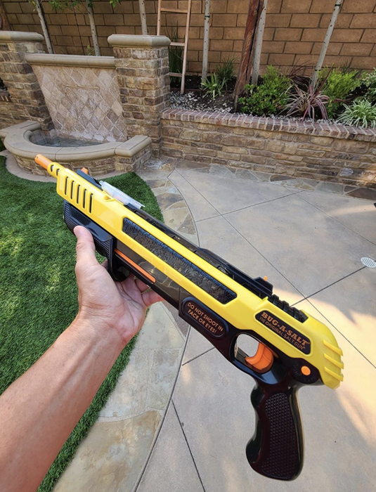 A reviewer happily uses the salt shooter in their backyard.