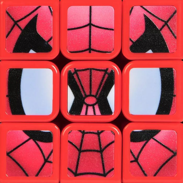 A close-up view of a Rubik's Cube, its pieces aligning to form Spider-Man's face, creating a Spider-Man-themed puzzle toy.