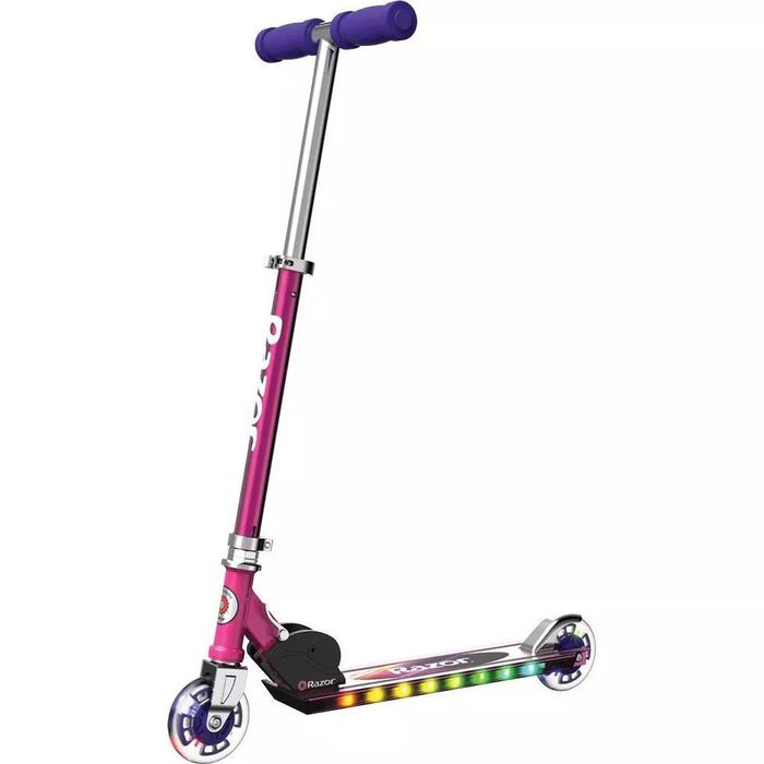 Razor scooter featuring LED lights on the deck, T-bar handle, and two wheels. Perfect for the shopping article context
