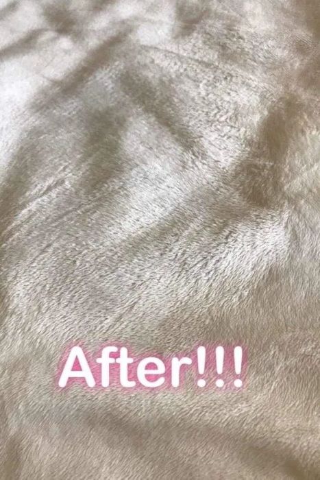 The same blanket, now spotless, with the text