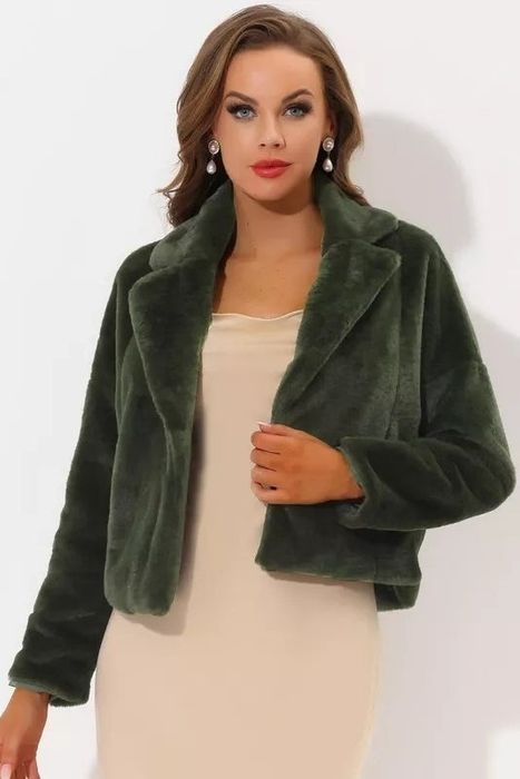 A model showcasing a stylish army green coat.
