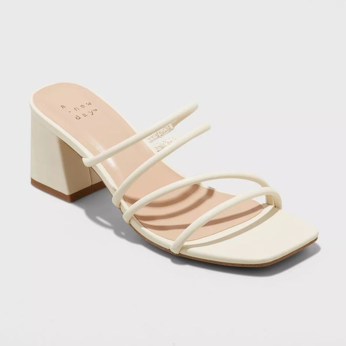 Cream-colored strappy block heels