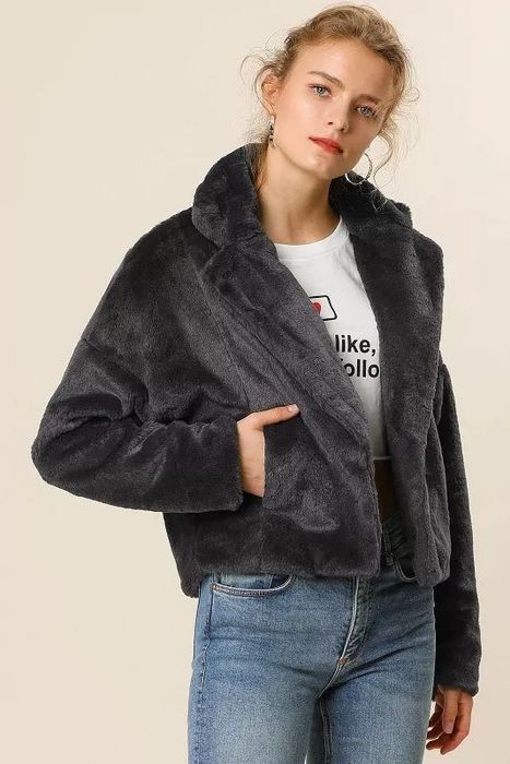 model wearing the black coat