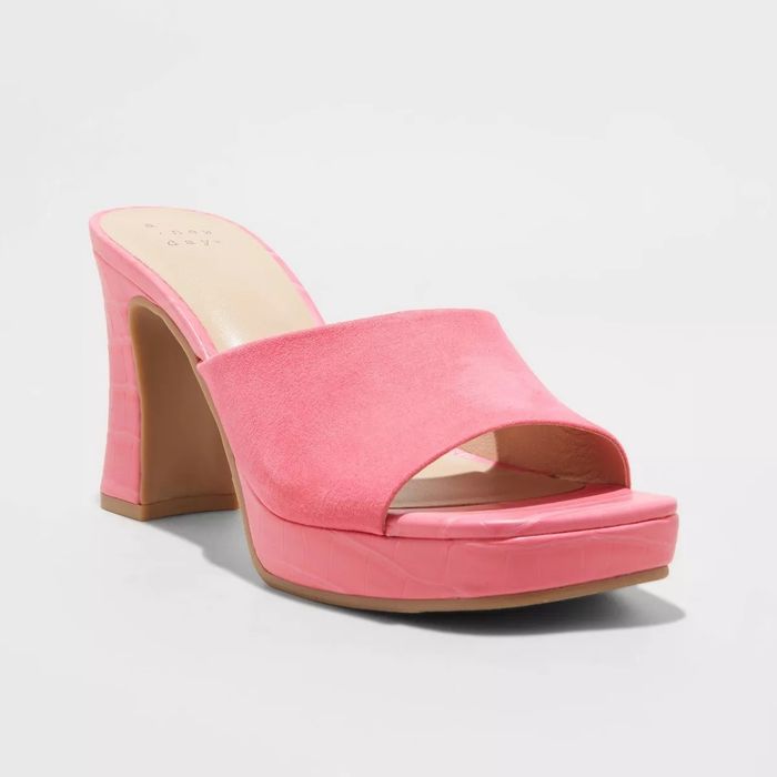 pink mule heels with an open toe design