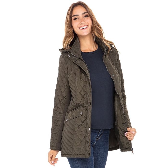Someone wearing a brown quilted jacket with a cozy hood.