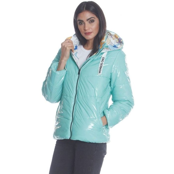 a person rocking a shiny turquoise puffer jacket