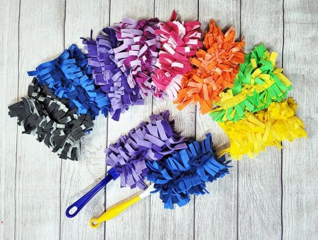 A set of reusable Swiffer dusters available in a variety of colors