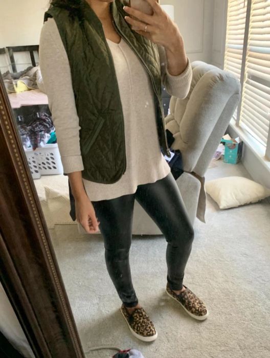 a reviewer showcasing the leggings
