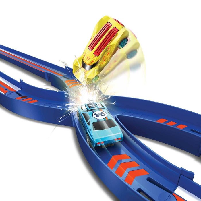 Two Hot Wheels cars colliding on the track