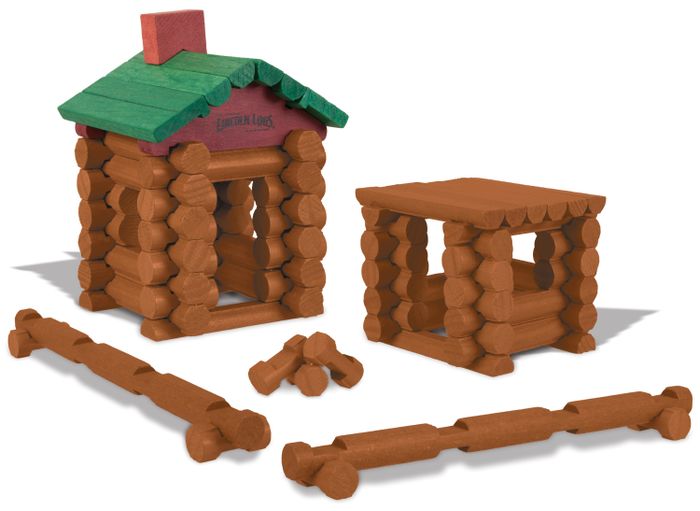 Lincoln Logs arranged to create a fence, a home, and a fire pit.