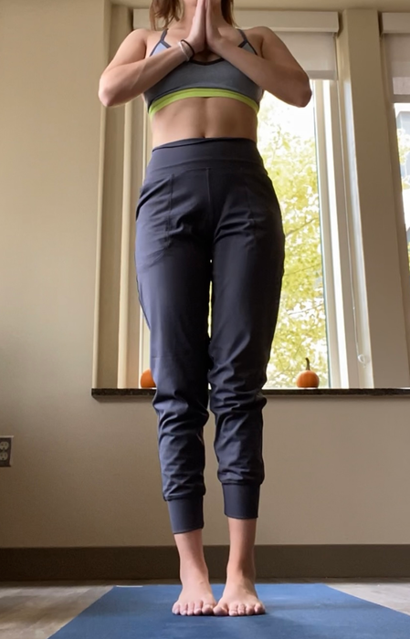 Image showing a reviewer in black pants