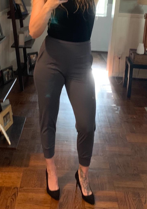 Image of a reviewer wearing dark gray pants.