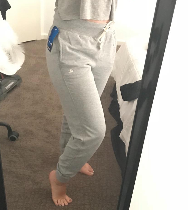 Reviewer sporting gray pants in the image